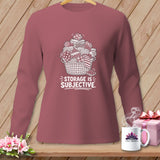 Long sleeve shirt with a graphic of a basket of folded fabric and text 