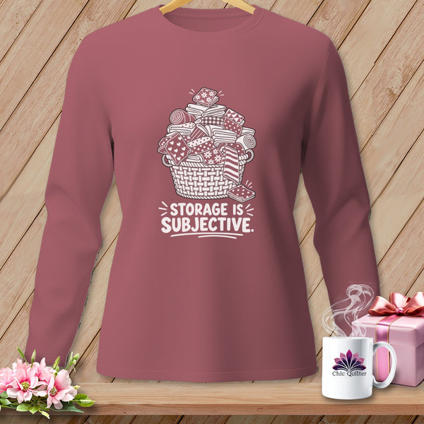 Long sleeve shirt with a graphic of a basket of folded fabric and text "STORAGE IS SUBJECTIVE."