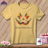 Yellow t-shirt with a patchwork jack-o'-lantern face and 
