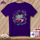 Purple t-shirt with a spider at a sewing machine, holding coffee.