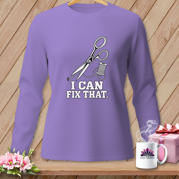 Purple long-sleeve shirt with scissors, thread, and "I CAN FIX THAT." text.