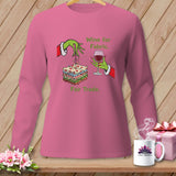 Pink long-sleeve shirt with Grinch hands holding fabric and wine, text 