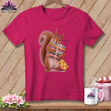 Fuchsia t-shirt with a squirrel holding colorful fabric stacks, text reads 