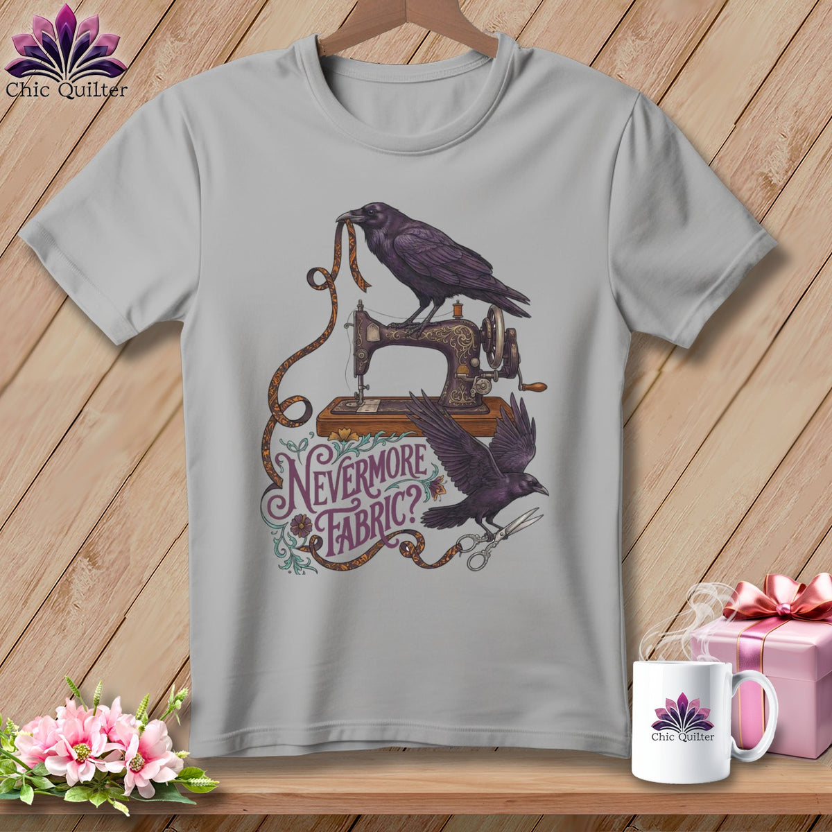 T-shirt with two ravens, a sewing machine, scissors, and text "Nevermore Fabric?"