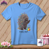 Light blue t-shirt with a porcupine holding a pin and a pincushion, text 