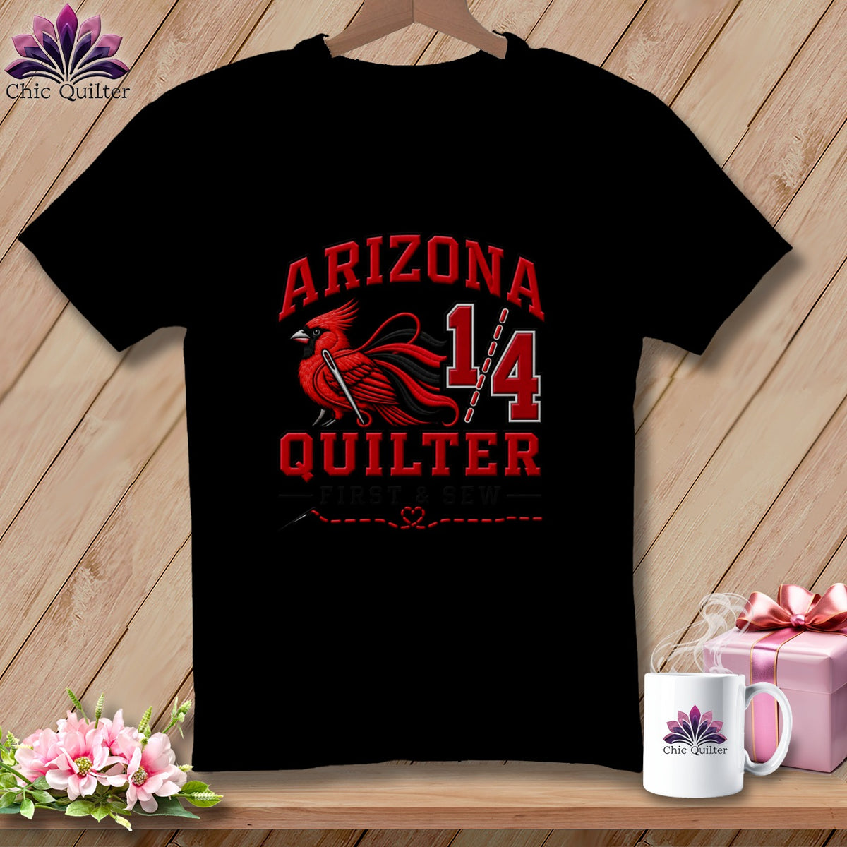 Black t-shirt featuring a red cardinal illustration, the text Arizona Quilter, and a sewing needle graphic.