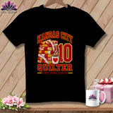 Black t-shirt featuring a Kansas City Quilter design with stacked quilts, a coffee mug, and the number 10.