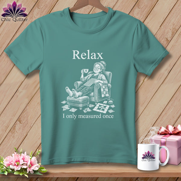 Teal t-shirt with "Relax" and "I only measured once" text and a woman relaxing.