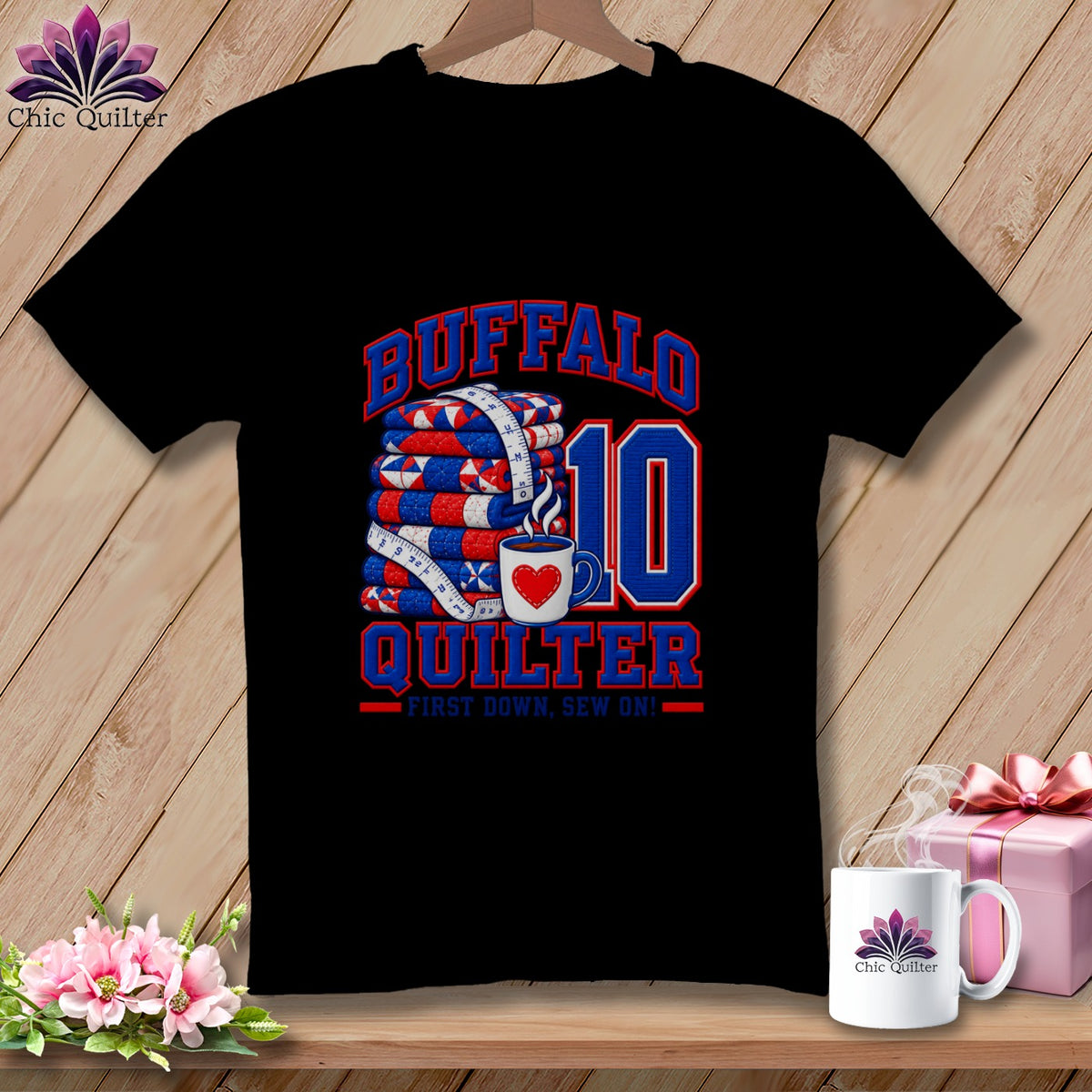 Black t-shirt featuring a red, white, and blue design with a folded quilt, coffee cup, and the text BUFFALO QUILTER.
