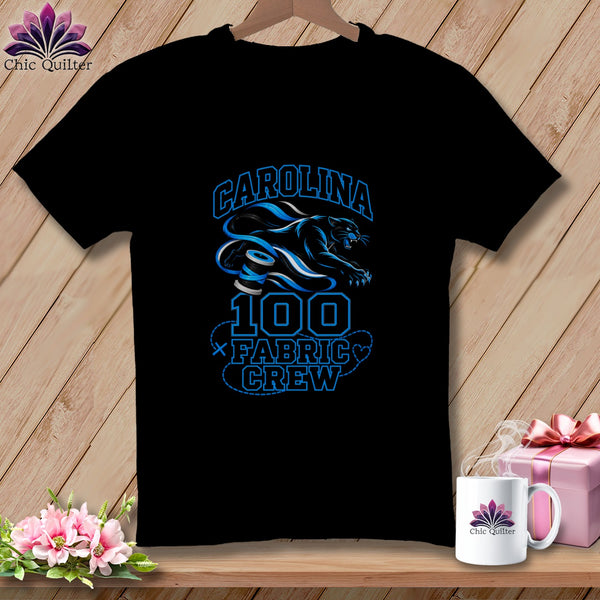 Black t-shirt featuring blue text reading Carolina 100 Fabric Crew alongside a panther graphic.