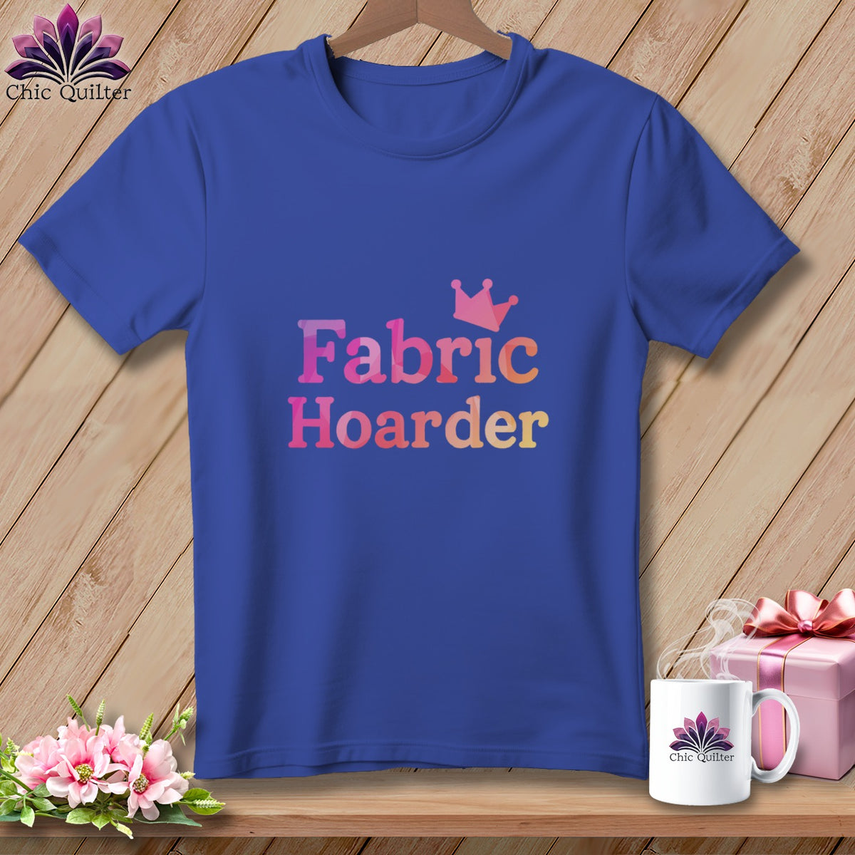 Blue t-shirt with "Fabric Hoarder" text and crown graphic.