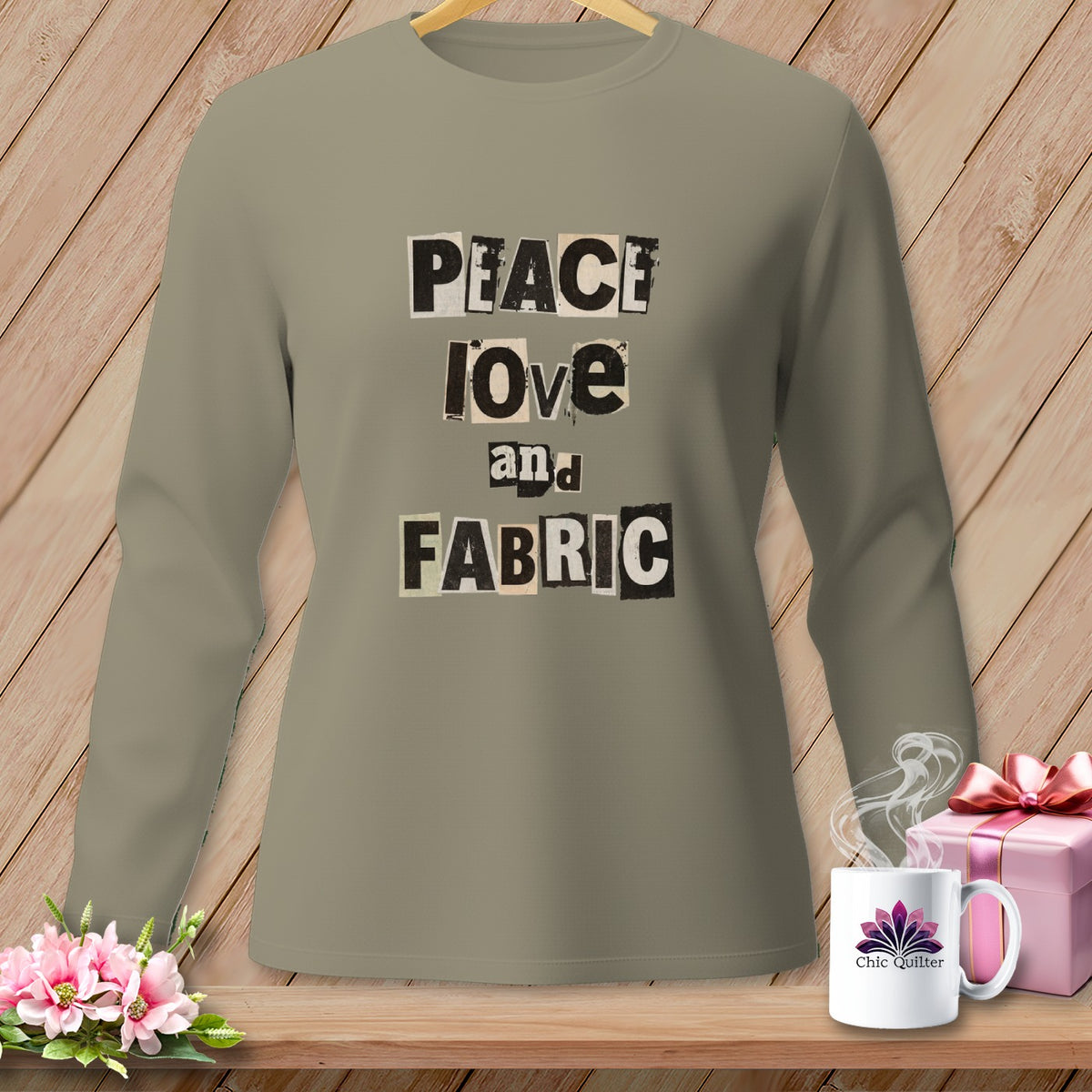 Long sleeve shirt with "PEACE Love and FABRIC" text collage in ransom font.