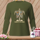 Green long-sleeve shirt with skeleton torso filled with fabric, text 