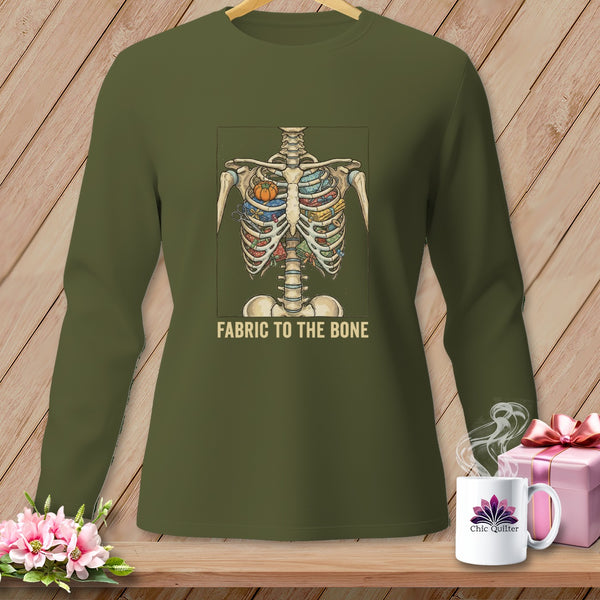 Green long-sleeve shirt with skeleton torso filled with fabric, text "FABRIC TO THE BONE".