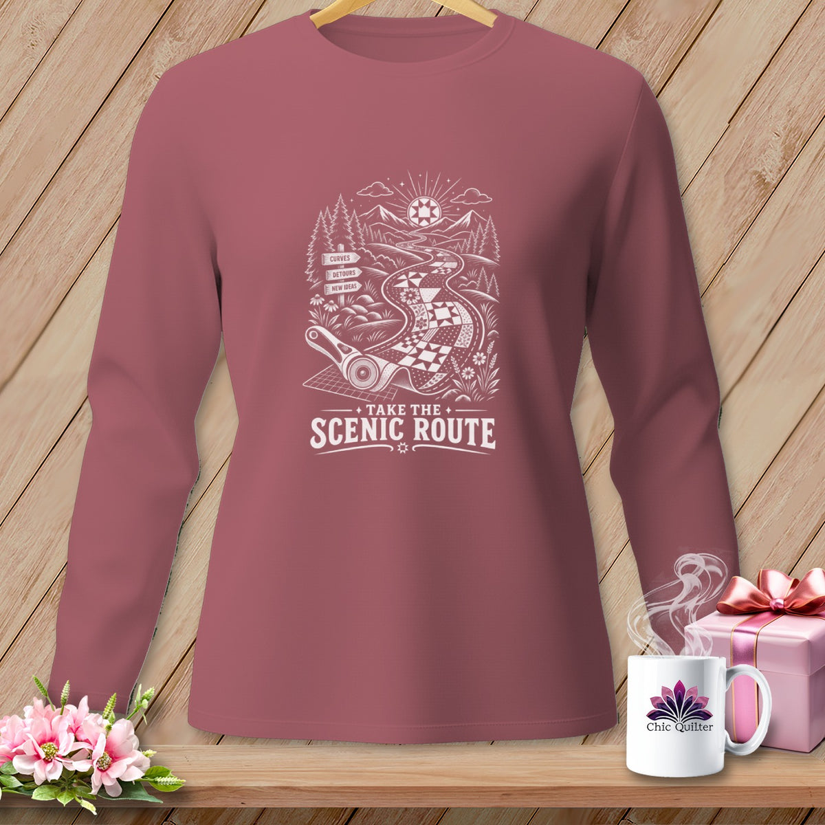 Long-sleeved shirt with a "Take the Scenic Route" graphic featuring a quilt road.