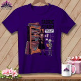 Purple t-shirt graphic of a witch and skeleton by a fabric stash.