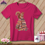 Fuchsia t-shirt with a squirrel holding fabric atop a pile of fabric.
