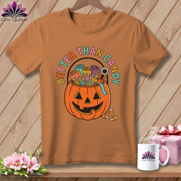 Orange t-shirt with jack-o'-lantern bucket filled with sewing notions and text "Better Than Candy."