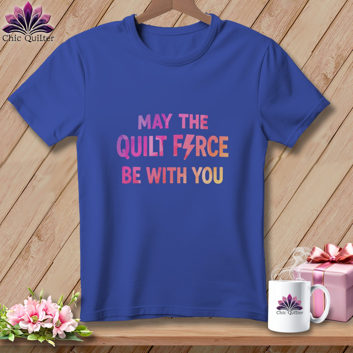 Blue t-shirt with "May the Quilt Force Be With You" text.