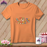 Orange crewneck t-shirt featuring a central graphic of colorful spools of thread.