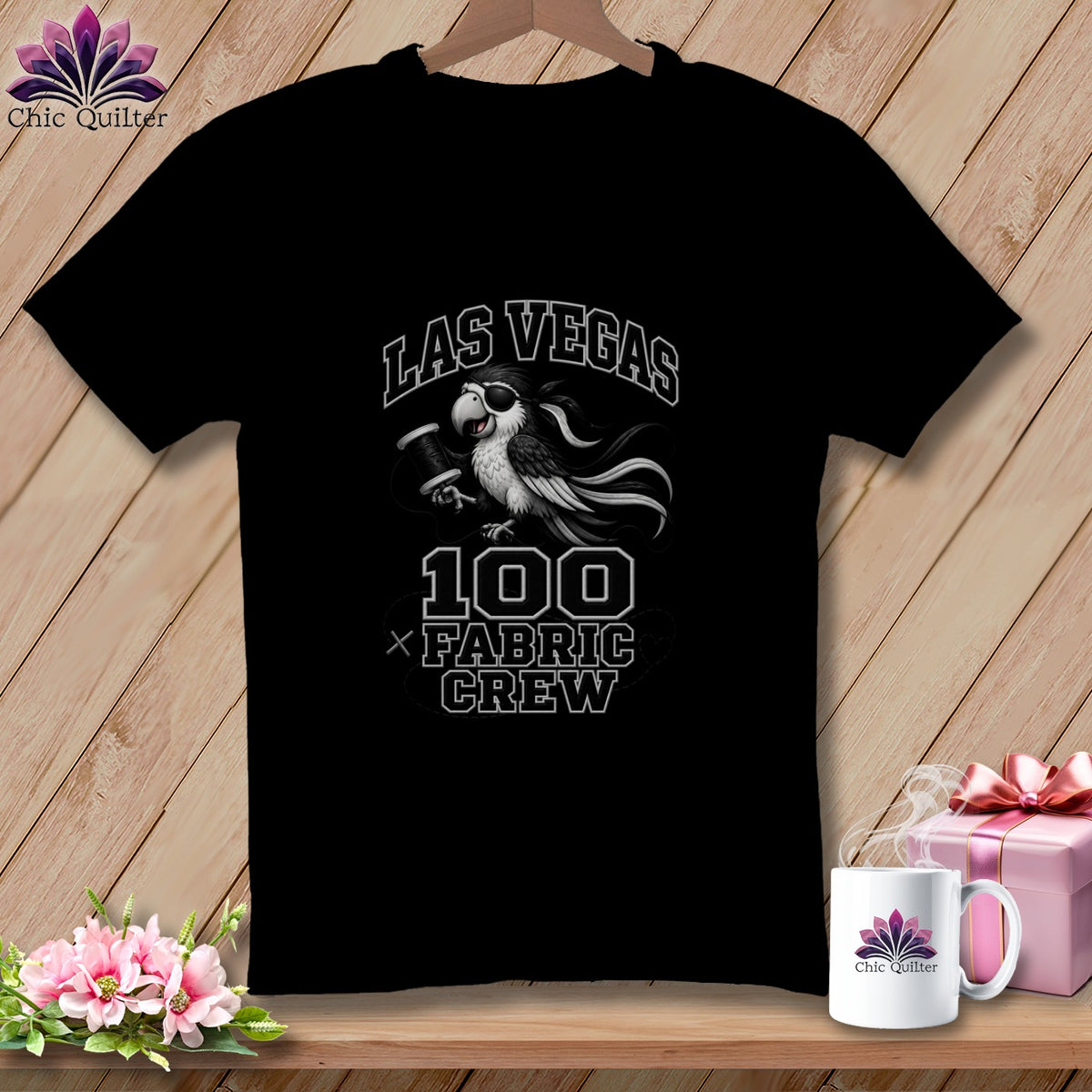 Black crewneck t-shirt featuring a pirate bird, spool of thread, and Las Vegas 100 Fabric Crew text.