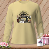 Long-sleeve shirt with sewing machine, dog, wine, and yarn graphic.