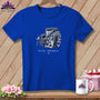 Royal blue t-shirt graphic with armchair, quilt, and text "STAY AWHILE."