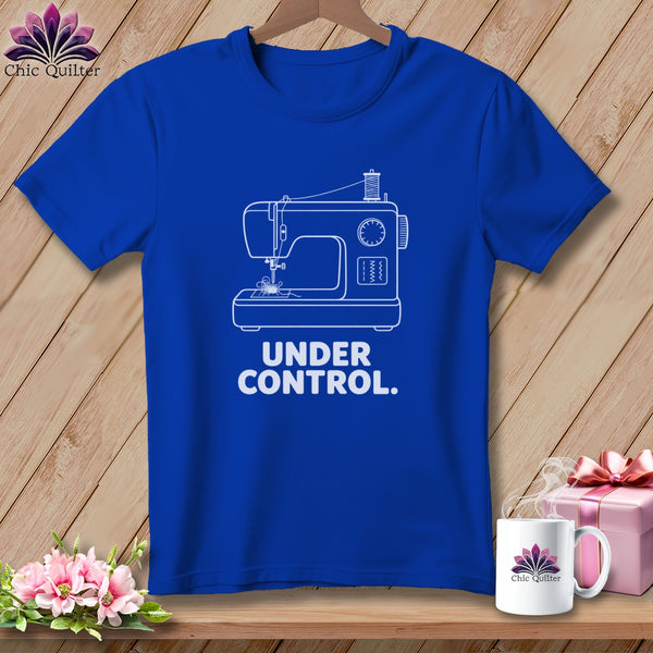 Blue t-shirt with white sewing machine graphic and text "UNDER CONTROL."