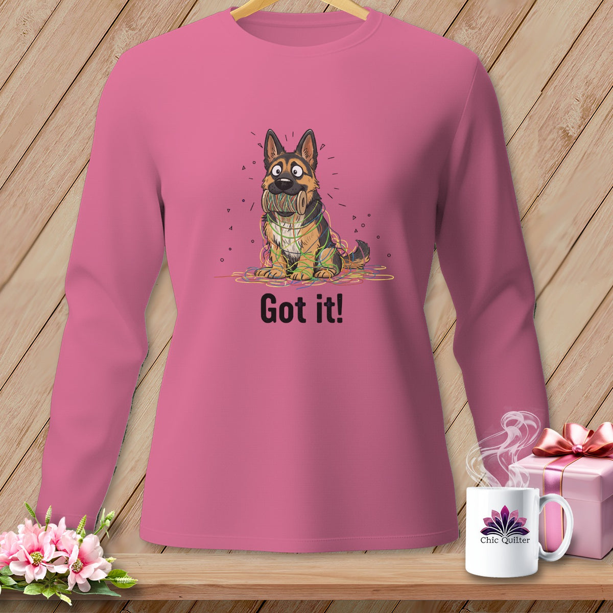 German Shepherd tangled in colorful yarn with "Got it!" text.