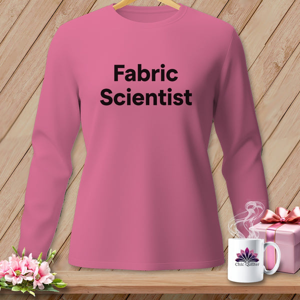 Pink long-sleeve shirt with "Fabric Scientist" text, mug, and gift box.