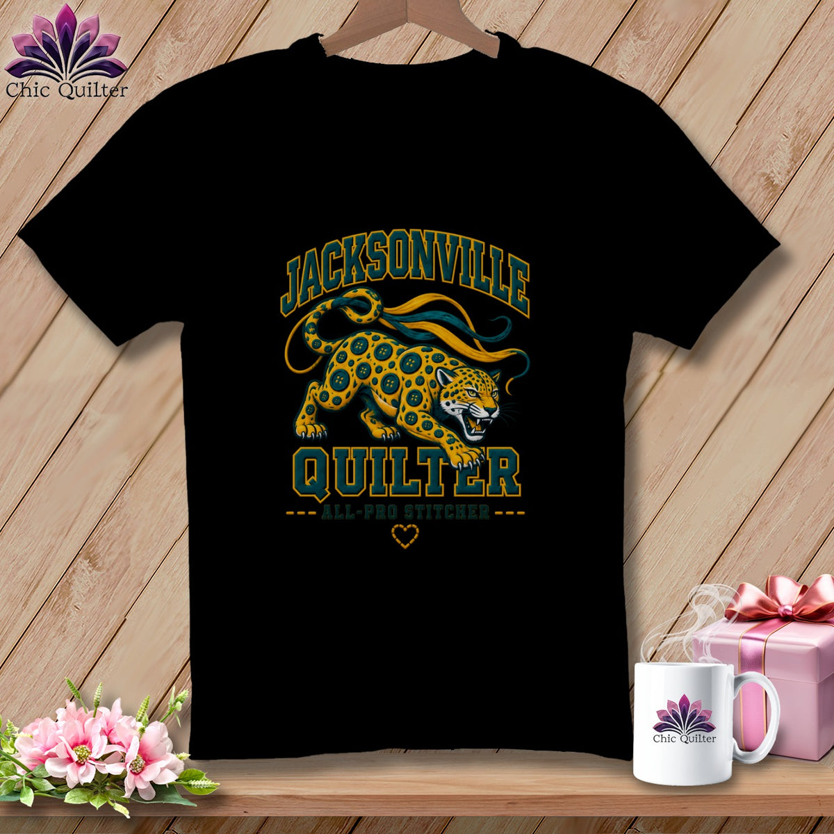 Black t-shirt featuring a Jacksonville Quilter graphic with a spotted cat design and text.