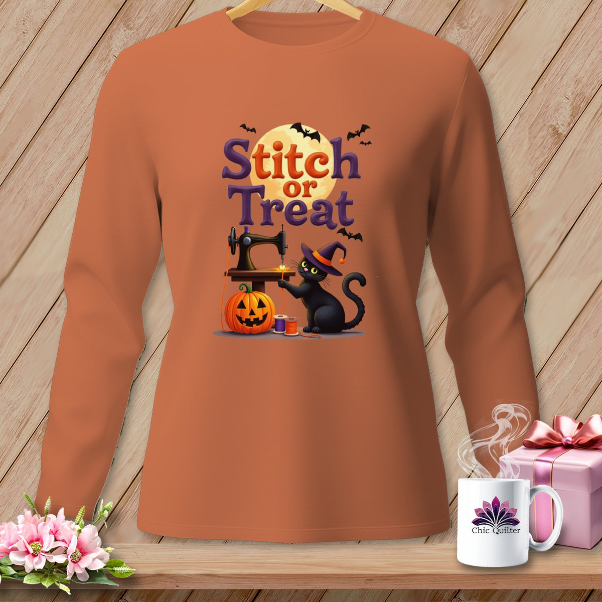 Black cat with witch hat sewing a pumpkin with text "Stitch or Treat".