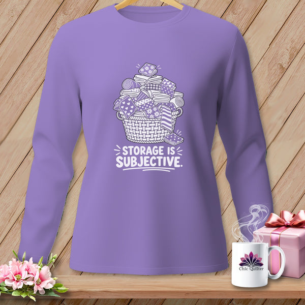 Purple long-sleeved shirt with a basket of fabric and the text "STORAGE IS SUBJECTIVE."