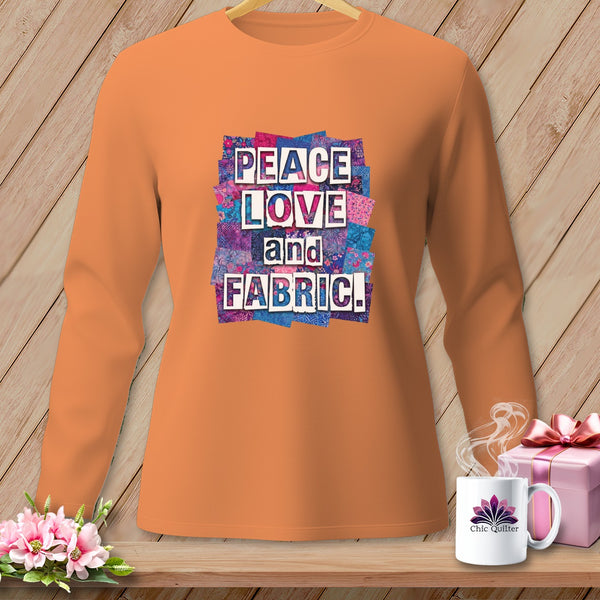 Orange long-sleeve shirt with "PEACE LOVE and FABRIC" graphic.