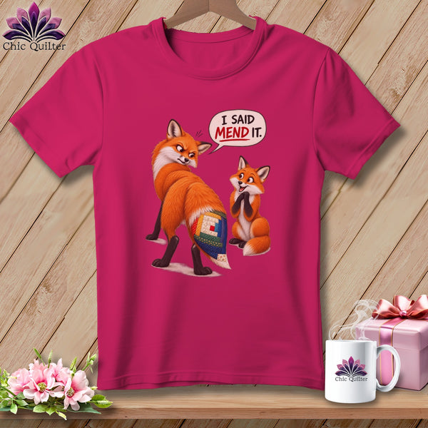 Two foxes, one with quilted tail, saying "I SAID MEND IT."