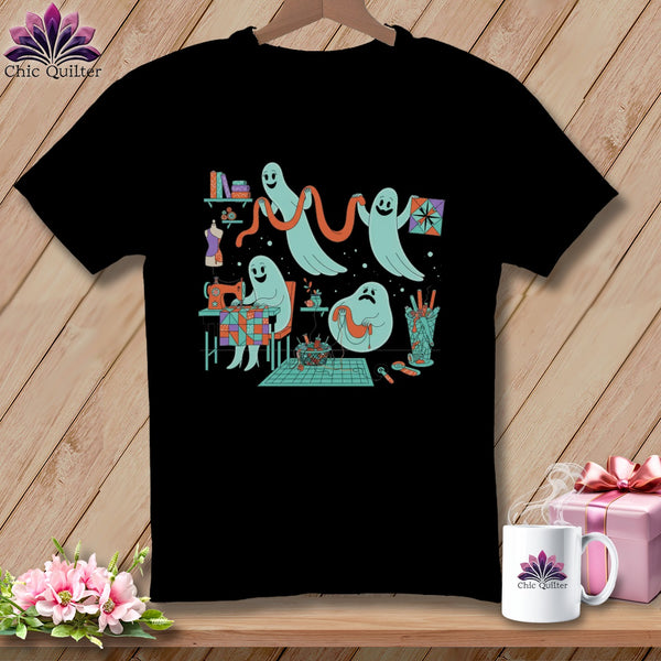 Black t-shirt with graphic of cute ghosts sewing and quilting.