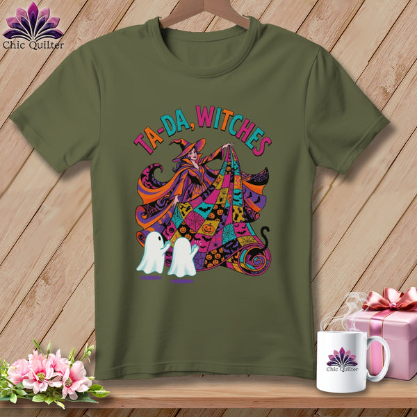 Green t-shirt with "Ta-da, Witches" text and Halloween graphic of a witch, ghosts, and pumpkins.