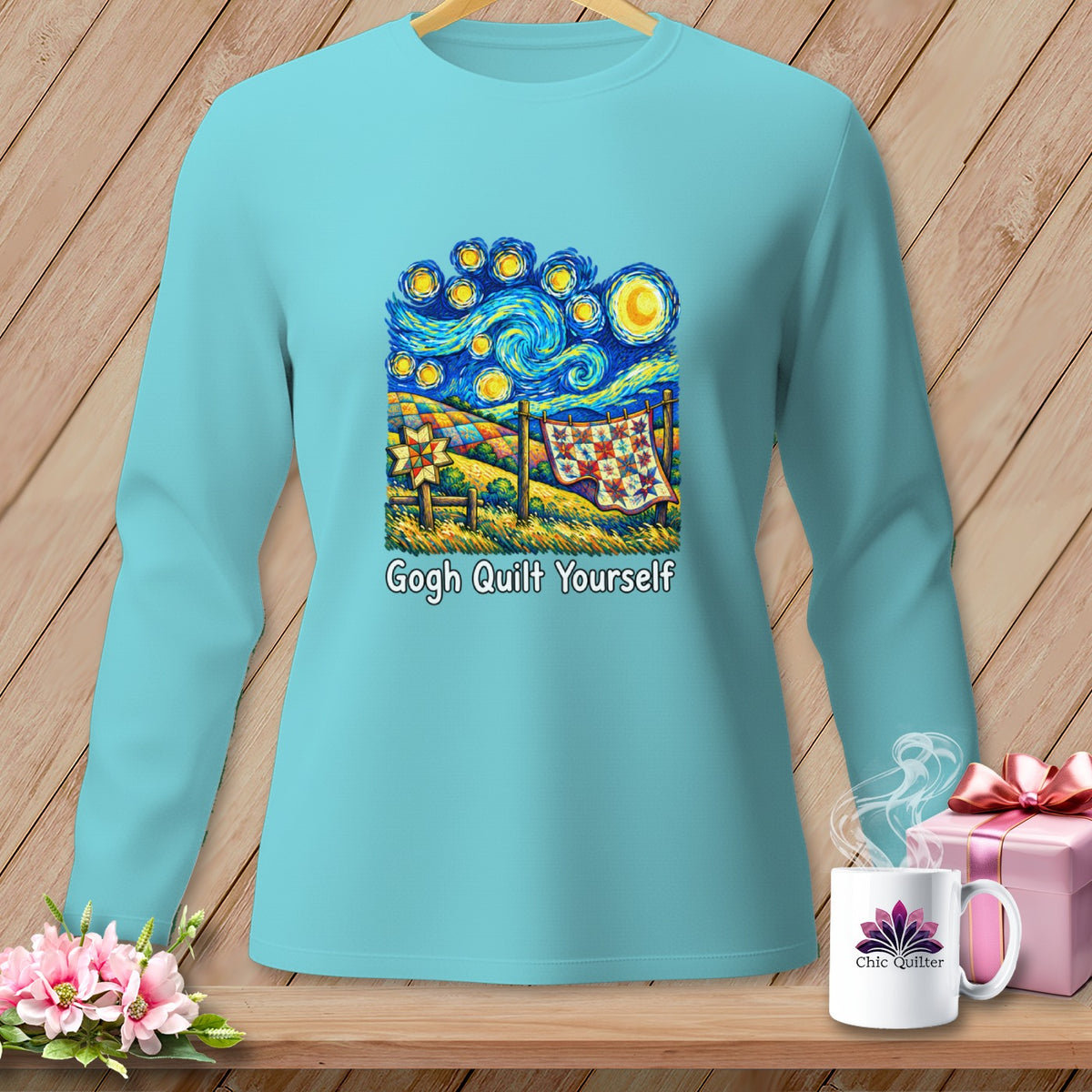 Long-sleeved turquoise shirt with "Gogh Quilt Yourself" text and a Van Gogh-inspired quilt design.