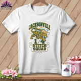 A white short-sleeved t-shirt with a graphic of a jaguar and Jacksonville 1/4 Stitch Squad text.
