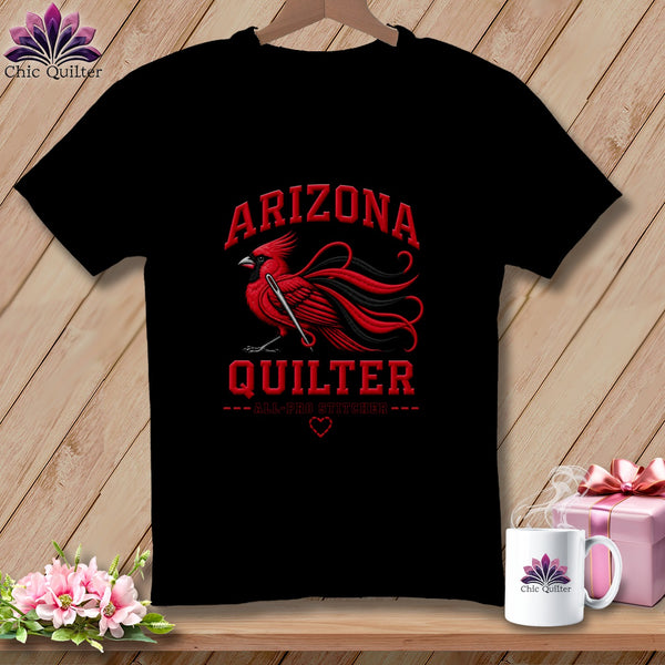 A black t-shirt features a red cardinal graphic and text that reads Arizona Quilter.
