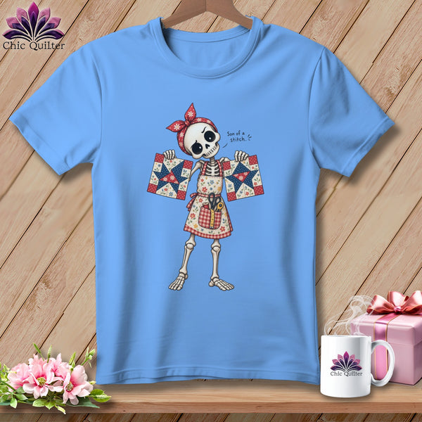 Skeleton wearing apron and bandana holding quilt squares, text "Son of a stitch".