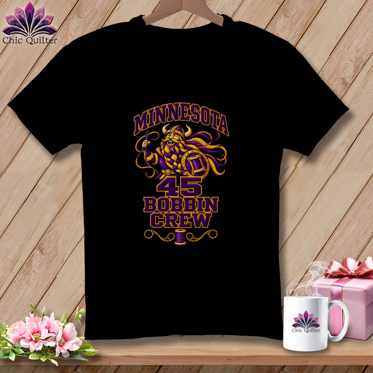 Black t-shirt featuring a purple and gold Viking graphic with the text Minnesota 45 Bobbin Crew.