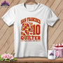 White t-shirt featuring a San Francisco Quilter graphic with a folded quilt stack and mug.