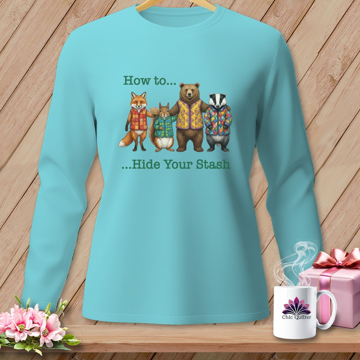 Aqua long-sleeved shirt with a graphic of four animals saying "How to... Hide Your Stash."