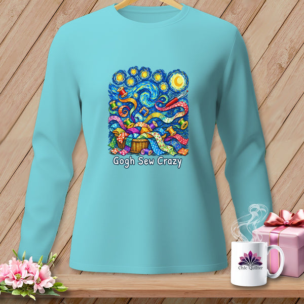 Light blue long-sleeve shirt with "Gogh Sew Crazy" quilting-themed artwork.