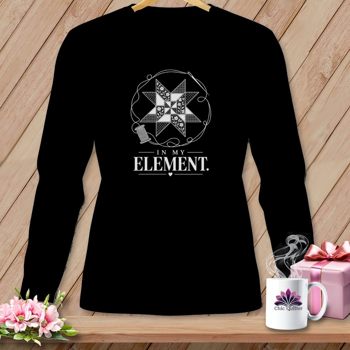 Black long-sleeve shirt with a quilt star design and "IN MY ELEMENT." text.