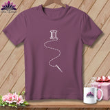Plum t-shirt with white thread and needle graphic; 