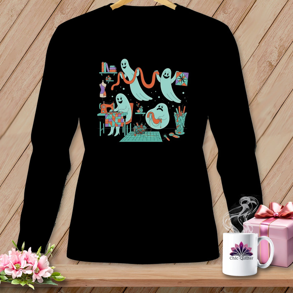 Black long-sleeve shirt with ghosts sewing and crafting on the front.