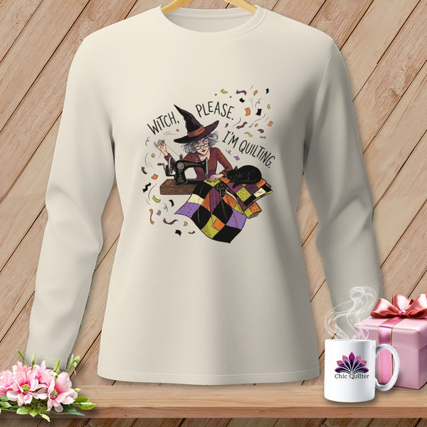 Cream sweatshirt with graphic of witch sewing, a cat, and text "Witch, please, I'm quilting."