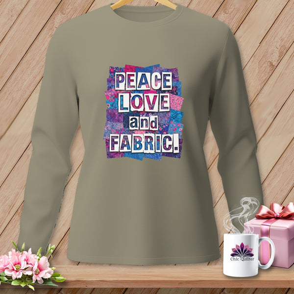 Long sleeve t-shirt with "PEACE LOVE and FABRIC!" graphic in colorful patchwork style.